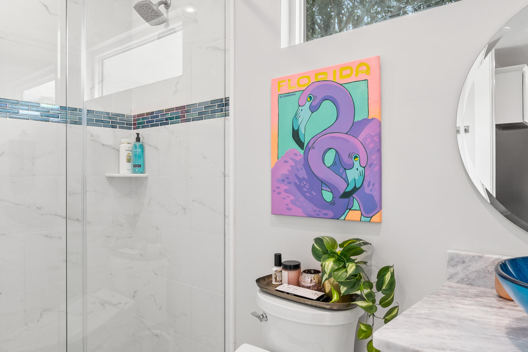 Paddington House bathroom Updated Paddington House bathroom with glass shower and colorful vanity details
