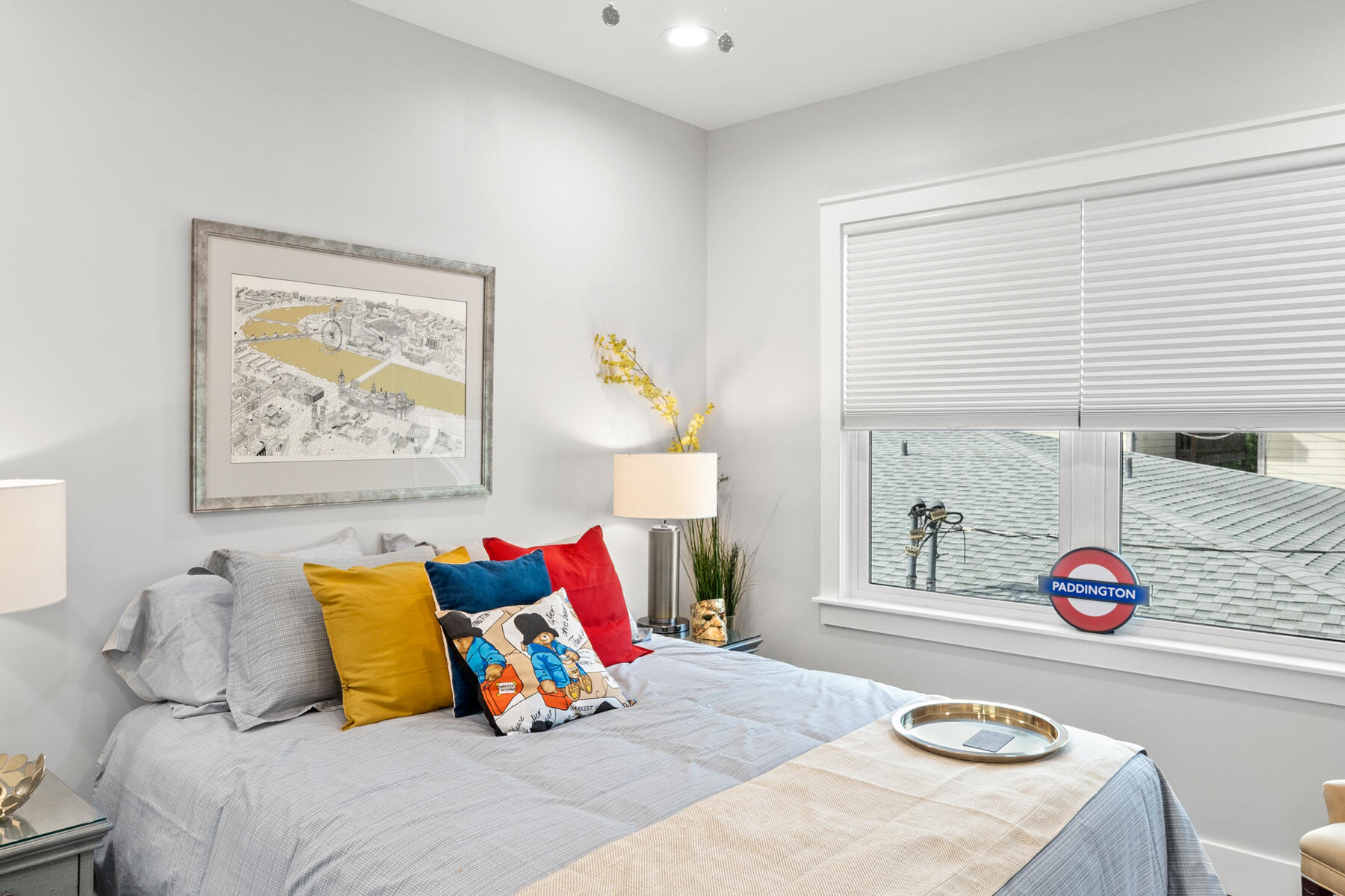 Paddington House bedroom Comfortable Paddington House queen bedroom with reading chair and bright windows